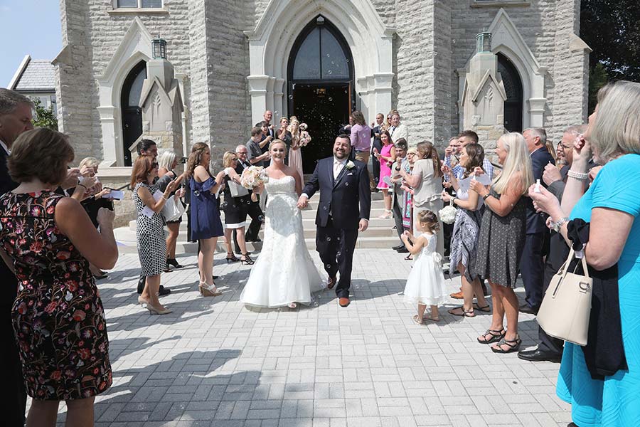 a bubble exit by the bride and groom at St. Rose Catholic Church Perrysburg