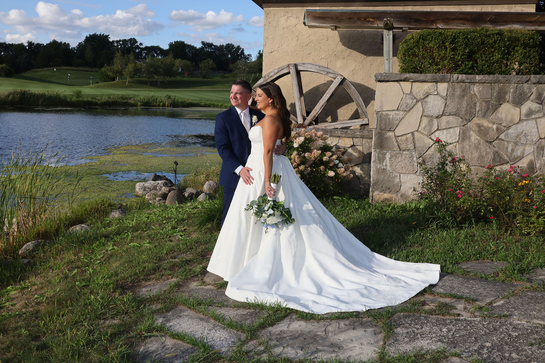  couple posing for wedding photos at Makray Memorial Golf Club in Chicago