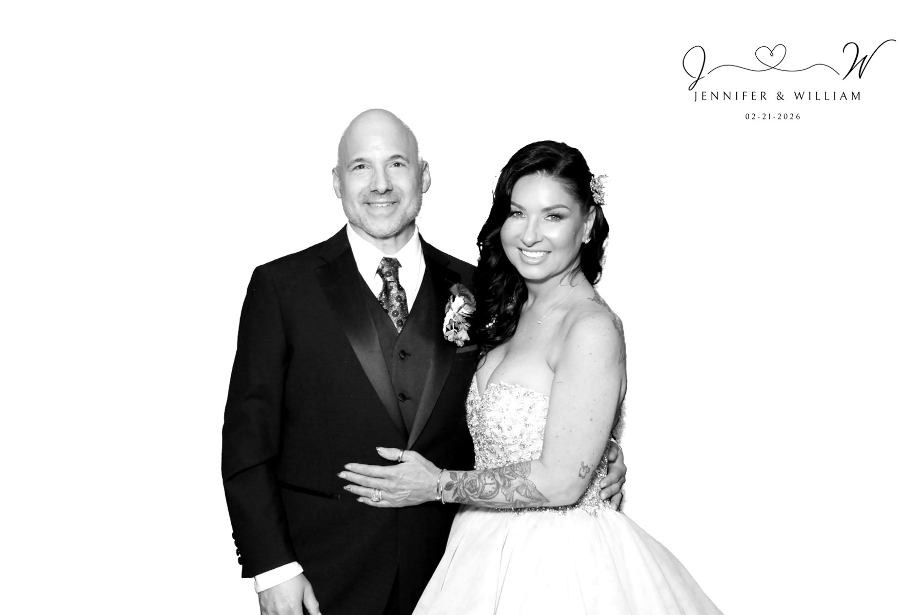 Detroit Wedding Photographer and Photo Booth -  newly married couple posing for a black and white glam photo booth photo at the Colony Club in Detroit, Michigan 