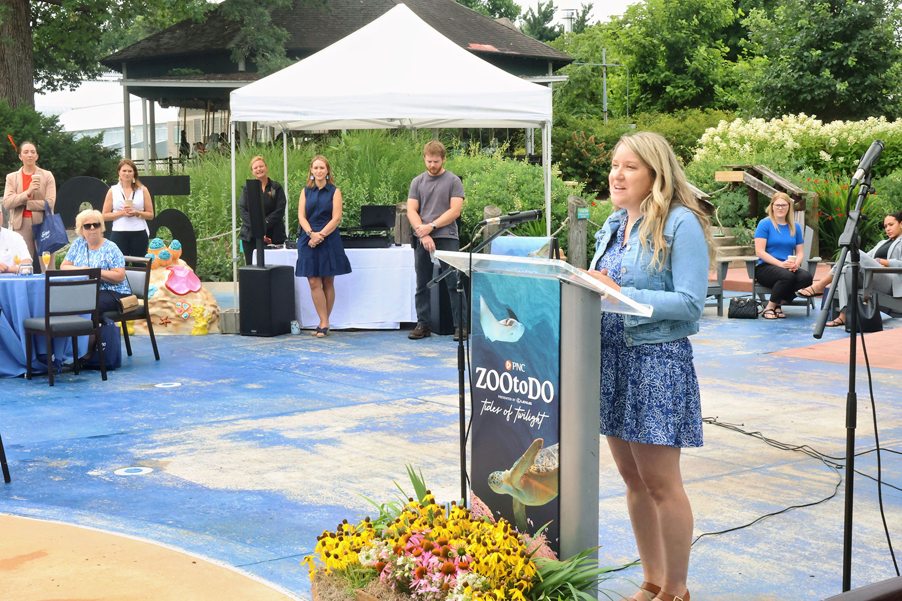 Erin Lieigk from 7 Little Cupcakes speaking at the Toledo Zoo for the Zoo to Do pre-party