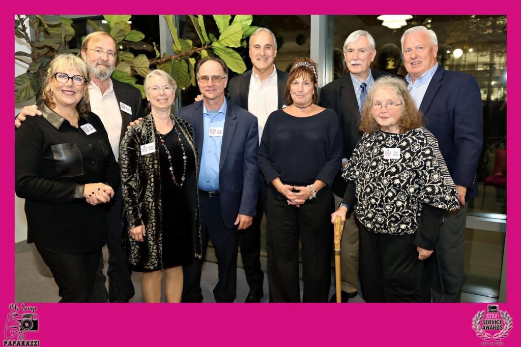 Owens Corning employees and their spouses pose for a photo at their annual service awards dinner