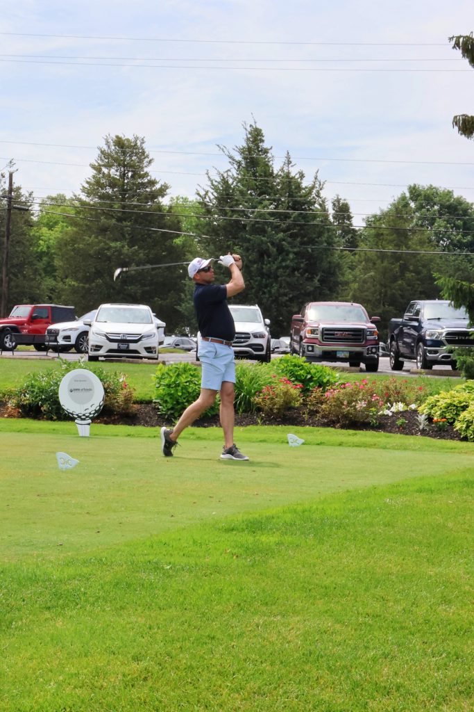 Scott Moewe of BMW of Toledo teeing off at the 17th tee at the Catawba Island Golf course