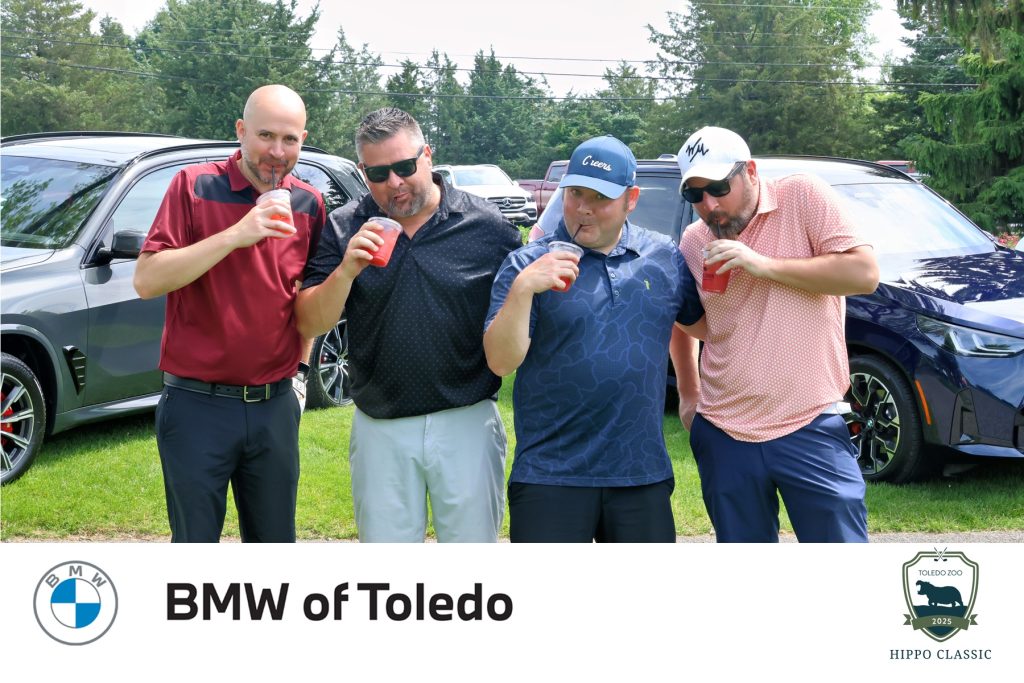 Team from Comfort Line enjoying the specialty watermelon cocktail created for the Toledo Zoo Hippo Classic