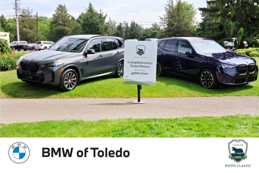 Two brand new BMWs provided the team photo backdrop at The Hippo Classic held at The Catawba Island Club