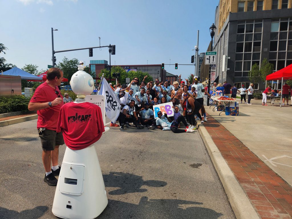 Rosie the Robot AI Photo Booth at JeepFest Toledo representing Med1Care