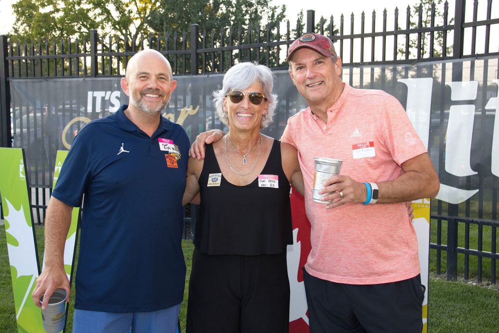 Matt Kripke, Jodi Hess and Mark Feldstein posing for a photo at the Sylvania Schools Reunion Festival