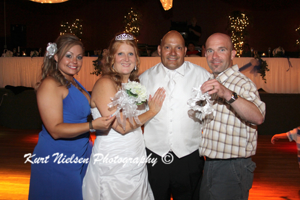 pictures of the bride and groom with the garter and bouquet catchers