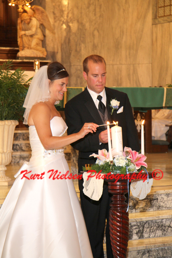 wedding couple lighting unity candle