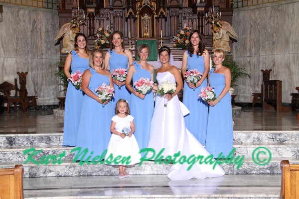 bride and bridesmaids in the church