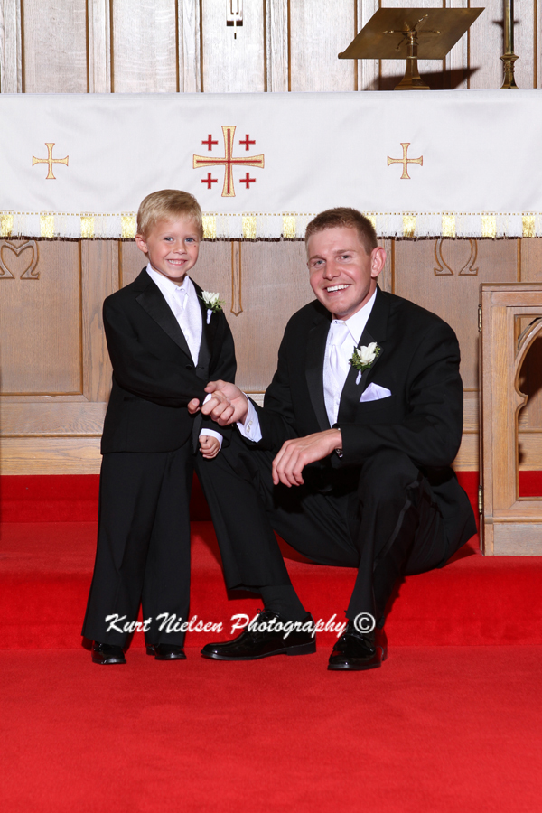 ring bearer and groom photos