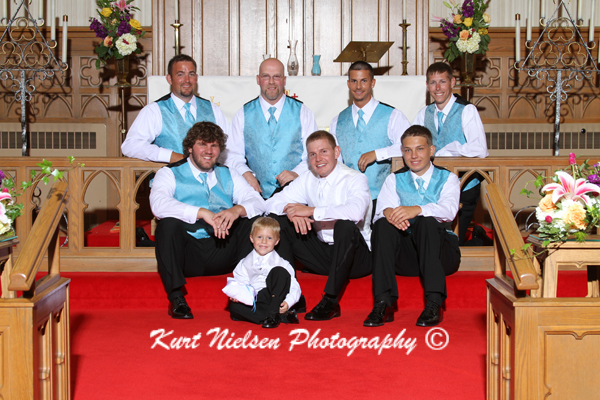 church formal photo of groomsmen