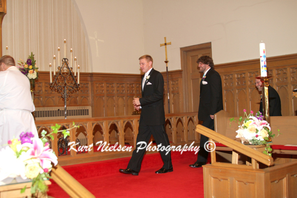 groom entering the church