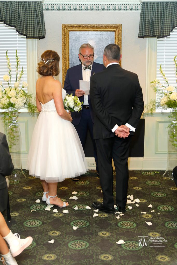 wedding ceremony in the Corinthian Room at the Toledo Club