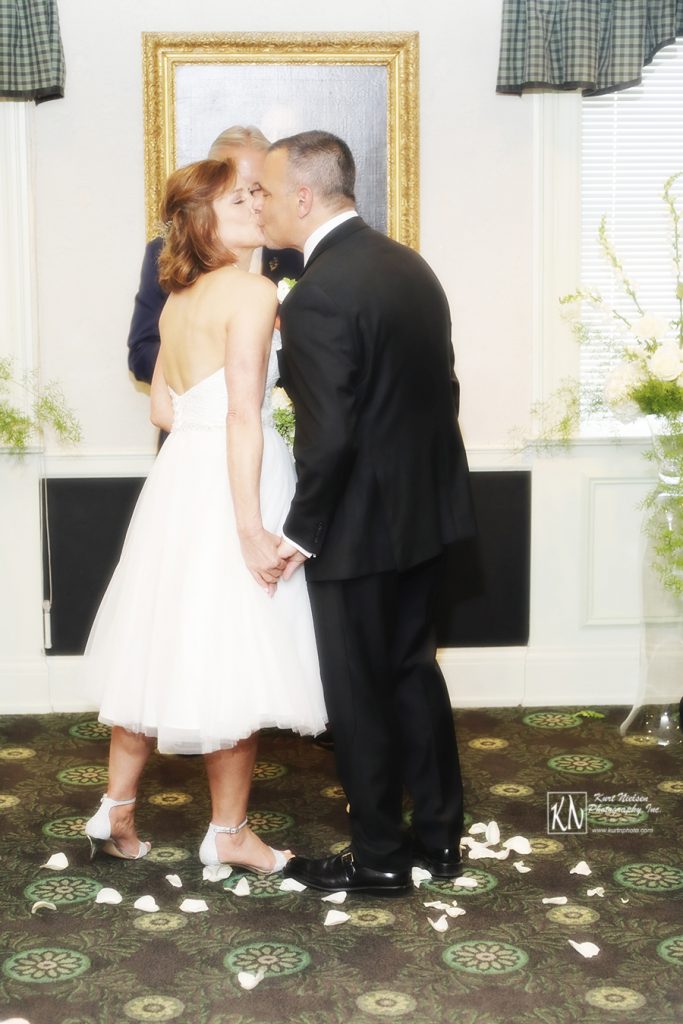 the wedding kiss at the altar