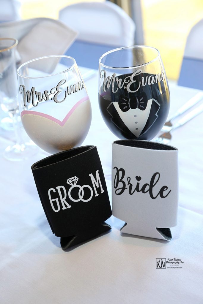 hand painted wedding wine glasses for the bride and groom from Hidden Talent Studio on etsy