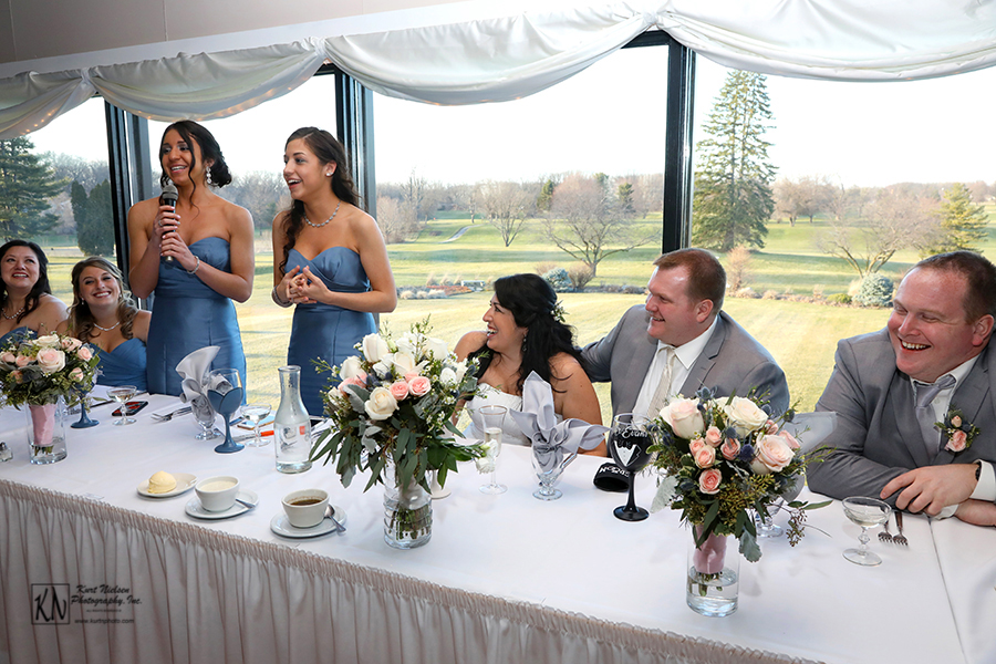 two maids of honor giving toasts