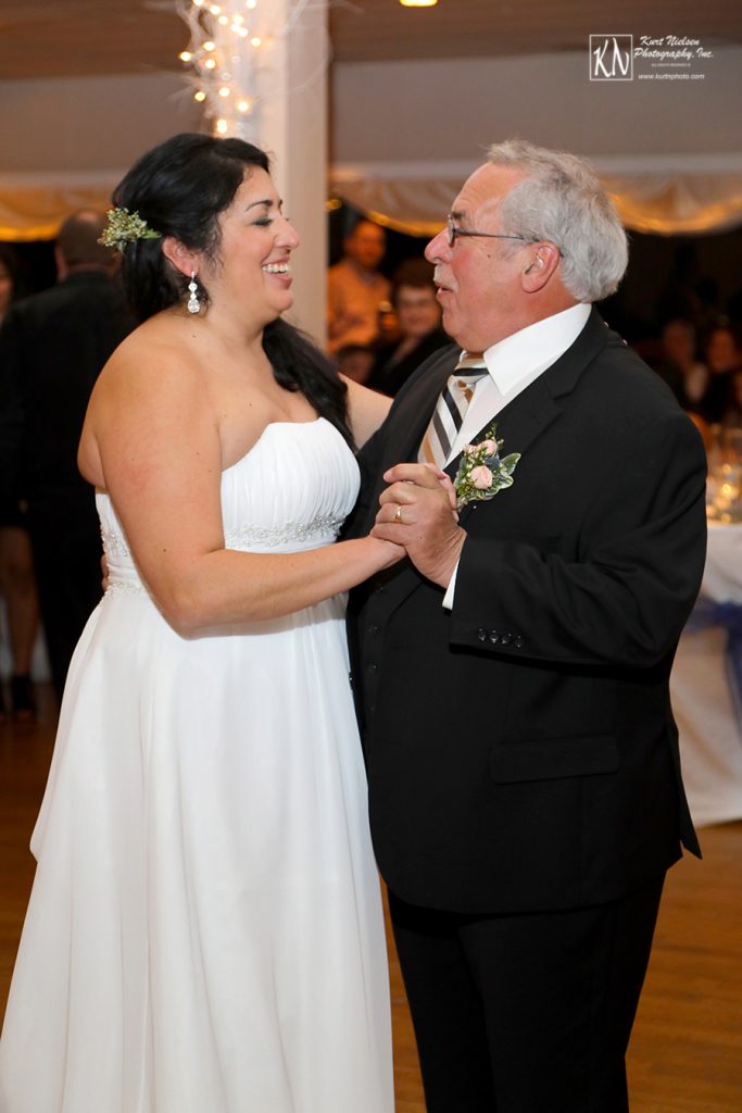 father and bride dancing