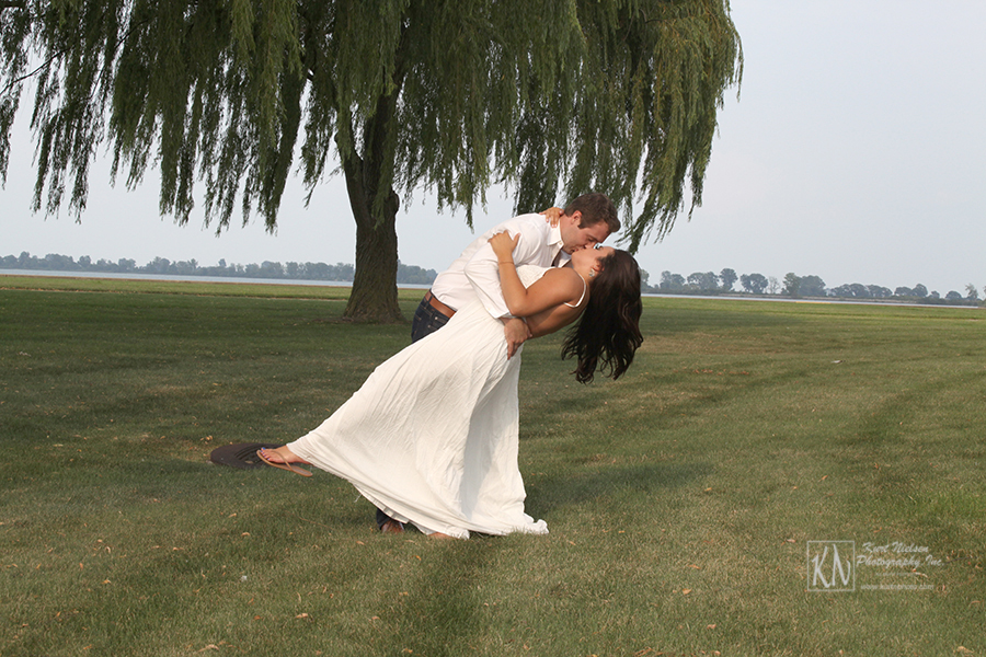 engagement portraits taken underneath the weeping willow tree