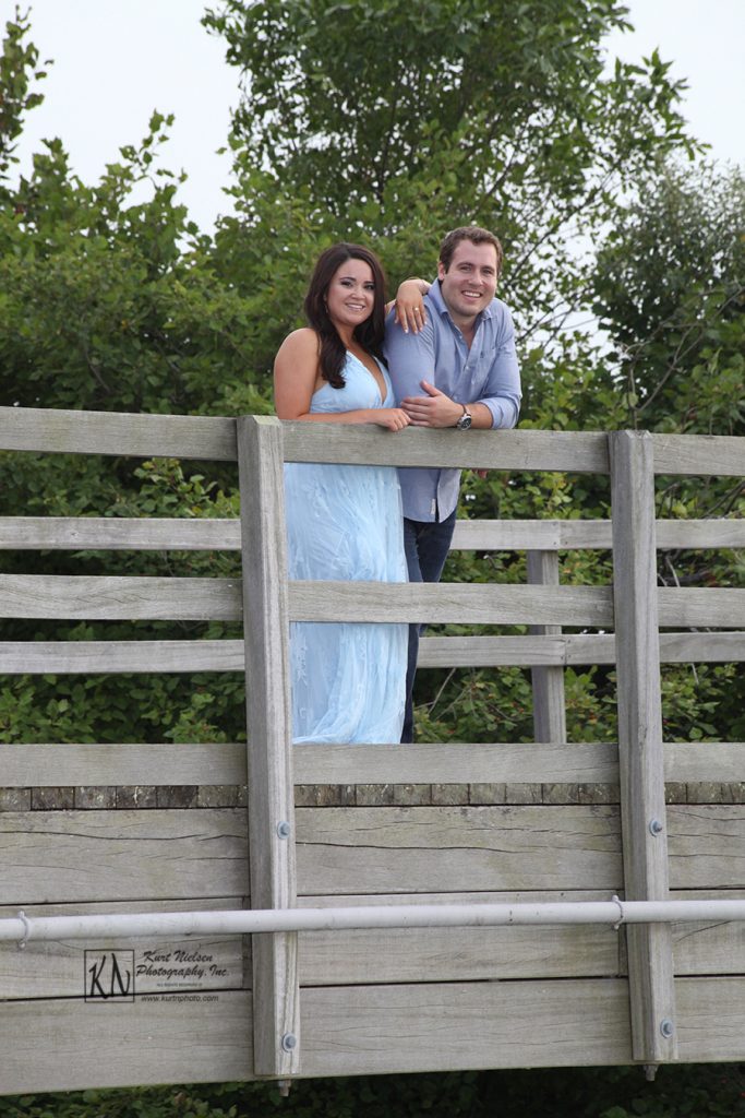 engagement photos atop the bridge at Maumee Bay State Park Lodge