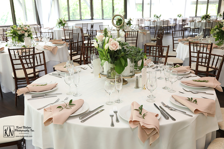 garden wedding with white linens and blush napkins