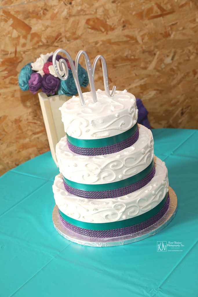 blue and teal wedding cake from Eston's Bakery in Toledo Ohio