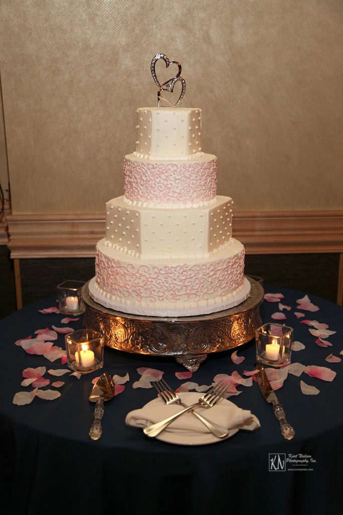 pink and white alternating layers wedding cake