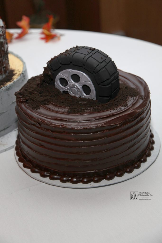 tire stuck in the mud groom's cake