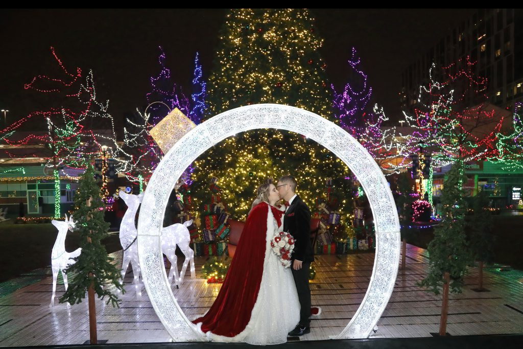 Christmas Wedding in Columbus Ohio - bride and groom at the park in Capitol Square in downtown columbus at christmas time